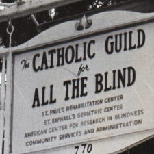 A black and white photo of the original sign at the foot of the Center’s driveway reading, “Catholic Guild for All The Blind.”