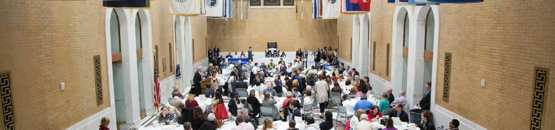 Hundreds of people gather in The Great Hall at the Massachusetts State House at a B.L.I.N.D. event.