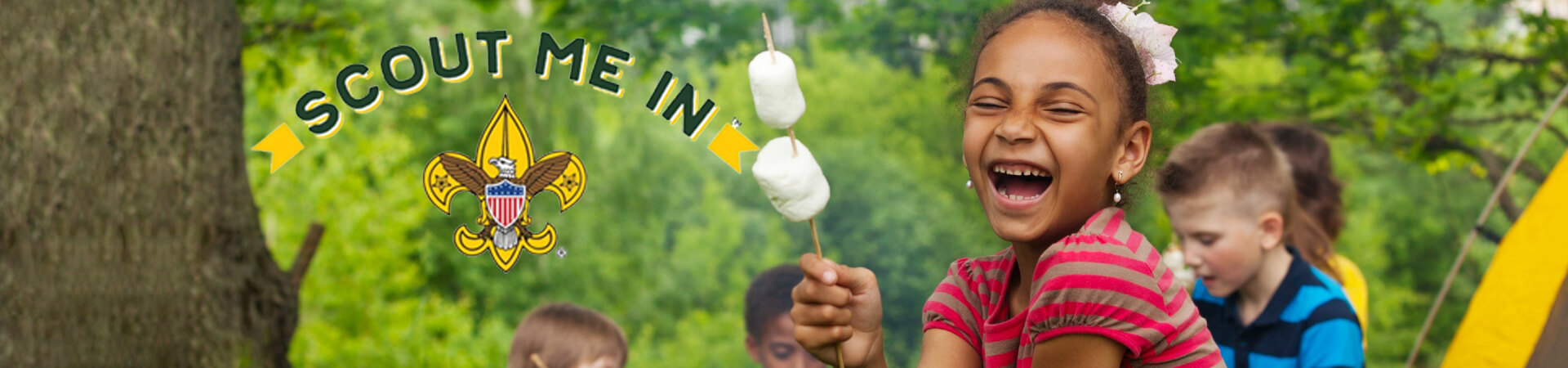 A young girl smiles as she holds up two marshmallow's on a stick. Three other kids and a tent are in the background. The words "Scout Me In" appear to the left of the young girl.