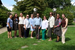 A group photo of 10 staff members on the School-Based Education Services Team