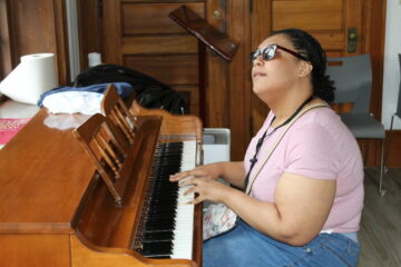 a girl playing piano