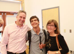 Nico with his father, Robb, and his grandmother, Maryellen, at the Carroll Center for the Blind Talent Show