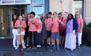 Group of Real World of Work Experience Interns and staff, standing in front of the Mandarin Hotel