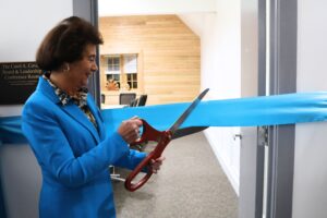 Carol Covell Cutting the Ribbon